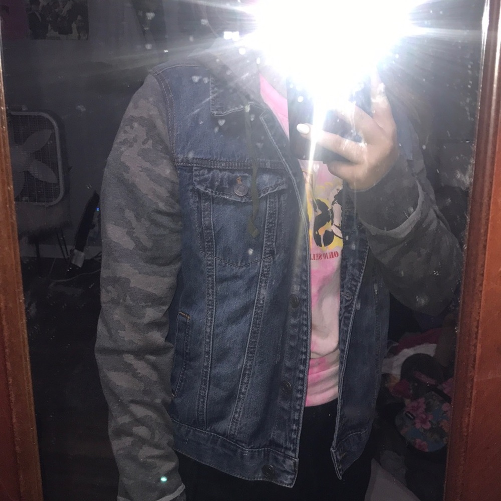 Super cute jean jacket with camo sleeves